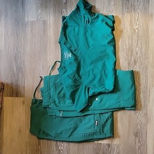Two Hunter Green scrub pants and One Hunter Green Scrub shirt